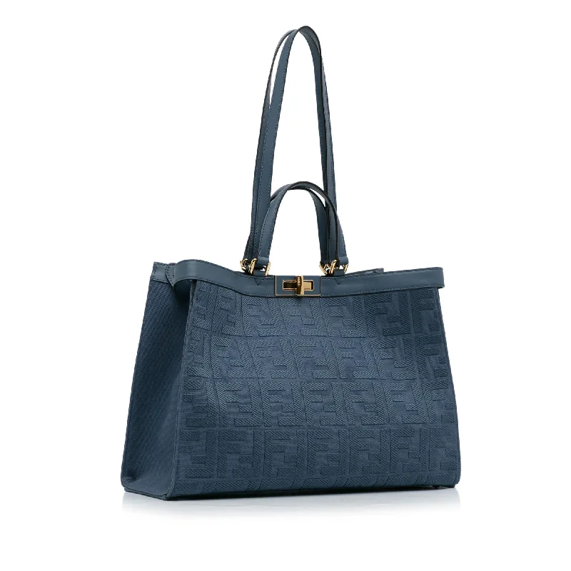 Fendi By The Way bags with a laser - cut leather detail for a modern and intricate lookFendi Zucca X-Tote (SHG-G2DUEE)