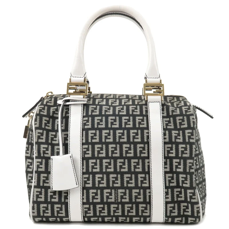 Fendi Baguette bags with a studded leather trim for a bold and edgy lookFENDI Zucchino Canvas Leather Boston Bag Black White 8BL068