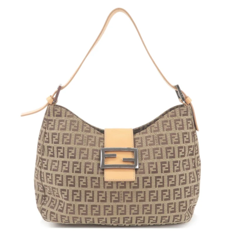 Fendi tote bags with a printed Fendi logo on the front for high brand visibilityFENDI Zucchino Canvas Leather Shoulder Bag Beige Brown 8BR036