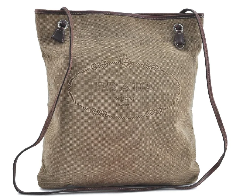 Prada Cleo bags with a snakeskin - effect panel for a bold and trendy lookAuthentic PRADA Canvas Leather Shoulder Cross Body Bag Brown H9476