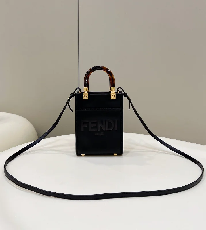 Ladies Fendi Peekaboo bags with a hand - carved leather detail for a unique and artisanal touchFendi Sunshine Shopper Black Mini Bag For Woman