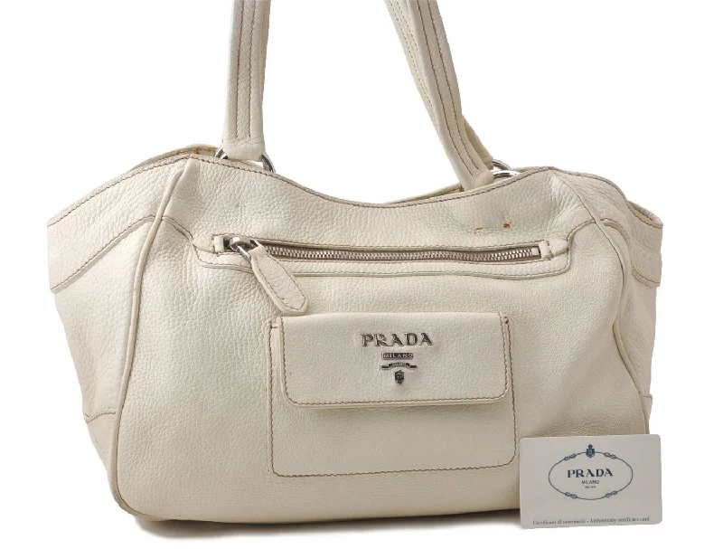 Prada Cahier bags featuring the signature triangular logo plaqueAuthentic PRADA VIT DAINO Leather Shoulder Hand Bag B3601 Ivory 0574D