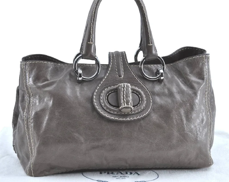 Prada handbags with a metal - framed clasp for durability and styleAuthentic PRADA Leather Hand Tote Gray H9385