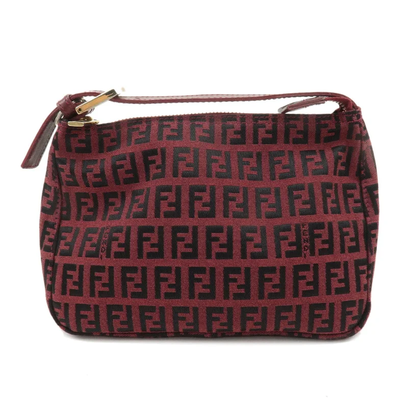 Ladies Fendi Peekaboo bags with a textured leather surface for a more tactile and luxurious feelFENDI Zucchino Canvas Leather Pouch Hand Bag Red Black 8N0001