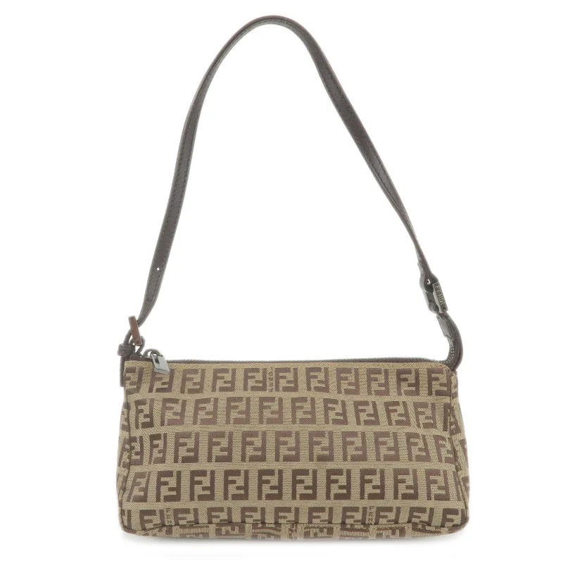 Ladies Fendi Peekaboo bags with a detachable shoulder strap for different carrying optionsFENDI Zucchino Canvas Leather Shoulder Bag Beige Brown 8BR249