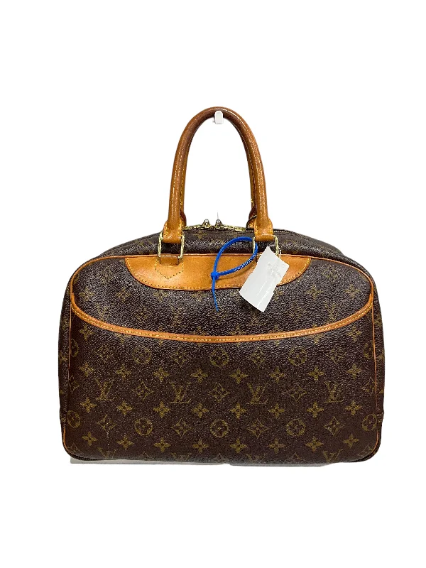 Ladies Louis Vuitton Capucines bags with gold - toned hardwareHandbag Designer By Louis Vuitton  Size: Large