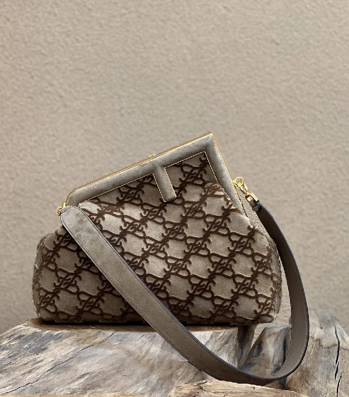 Fendi Baguette bags featuring the iconic FF logo plaque for a branded lookFendi Fendirst Medium Gray Bag For Woman 32.5cm/13in