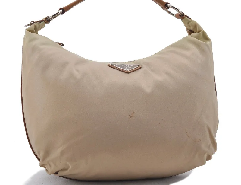 Prada Cleo bags with a contrast - colored interior for visual interestAuthentic PRADA Nylon Leather Hand Shoulder Bag Purse Beige 2083D