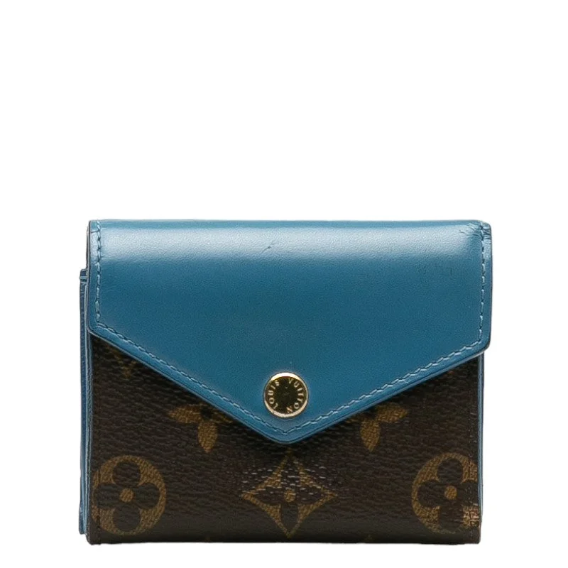 Ladies Louis Vuitton Petite Malle bags with a star - shaped charm for cutenessLouis Vuitton Monogram M63881 Long Wallet PVC/Leather Blue-Jean Brown