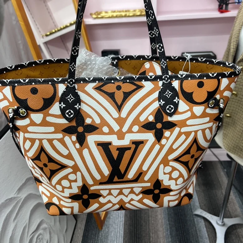 Louis Vuitton Twist bags with a crystal - embellished LV - turnlockLouis Vuitton Monogram Giant Crafty Neverfull MM