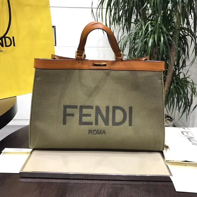 Fendi tote bags with a hand - painted FF pattern for an artisanal and one - of - a - kind touchFendi Peekaboo X-Tote Canvas Bag