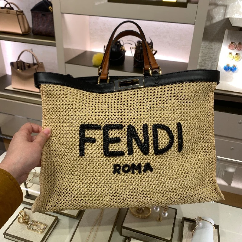 Fendi bags with a built - in USB charging port for keeping devices powered on the goFendi Peekaboo X-tote Medium Woven Straw Tote Bag