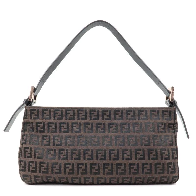 Fendi Baguette bags with a detachable charm featuring the brand's mascotFENDI Zucchino Canvas Leather Shoulder Bag Brown Bronze 8BR464