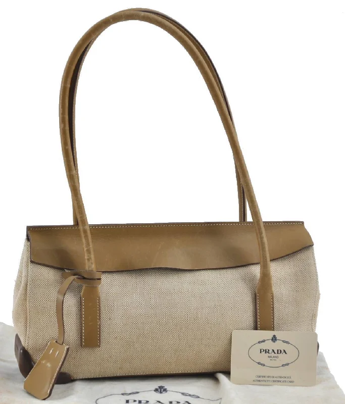 Prada bags with a zippered interior pocket for separating itemsAuthentic PRADA Canvas Leather Shoulder Hand Bag Beige Brown H1425