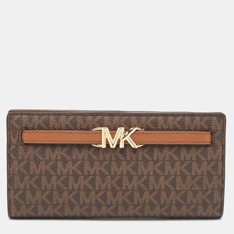 Michael Michael Kors gym bags for fitness loversBrown Signature Coated Canvas Large Reed Wallet