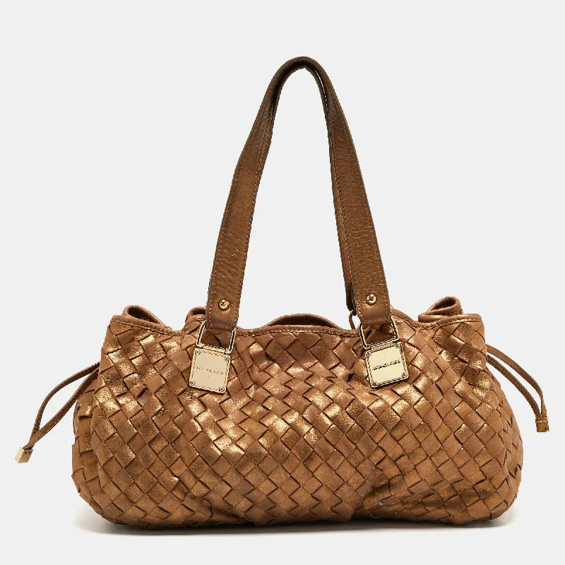 Michael Michael Kors Bags for celebrities on the red carpet (if applicable)Gold Woven Leather Drawstring Tote