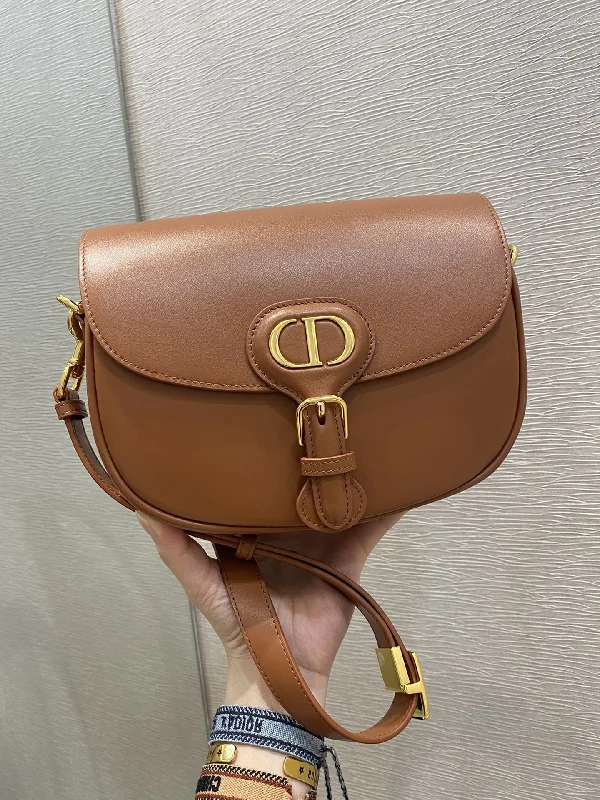 Christian Dior handbags with a snap - button closure and a decorative buckleChristian Dior Brown MeChristian Diorum Bobby Bag