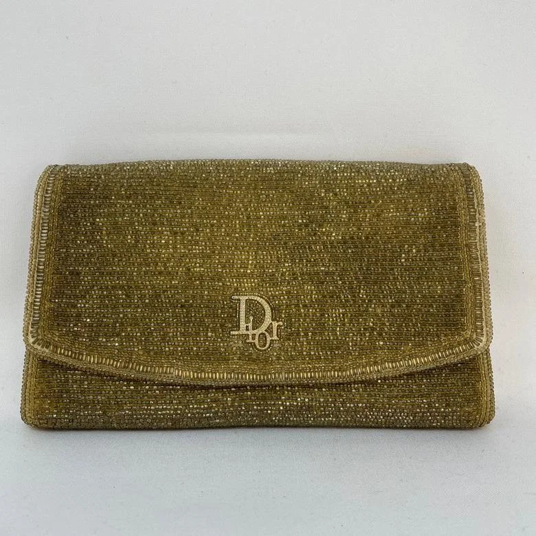 Christian Dior Saddle bags with a patent leather finish for a shiny lookDior Vintage Shiny Gold Wallet On Chain